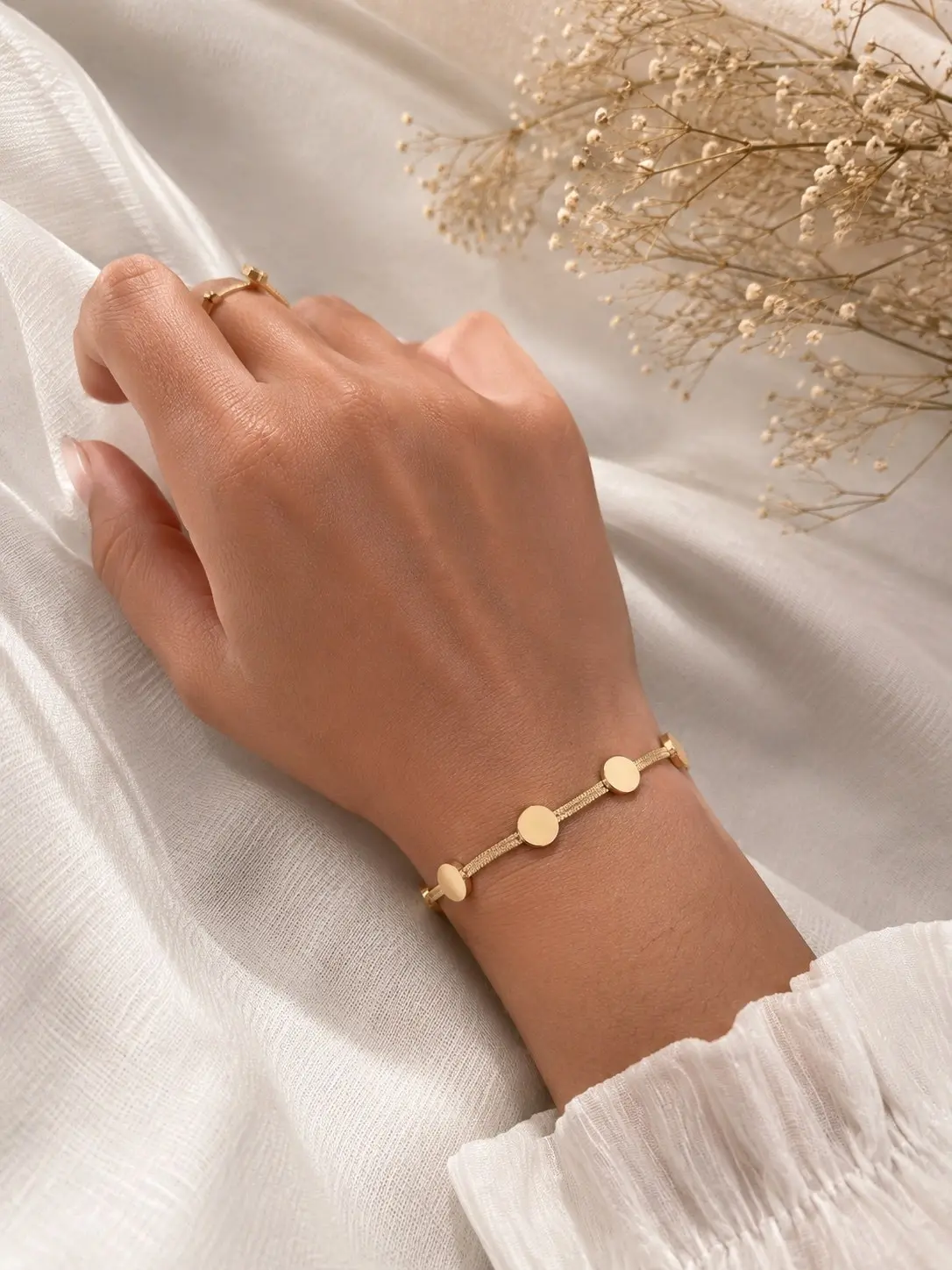Disc bracelet